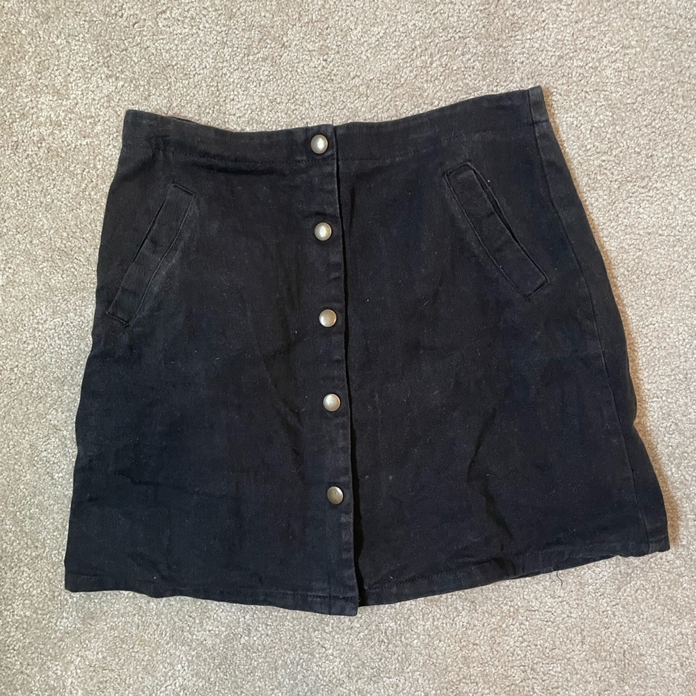 Francesca’s black skirt